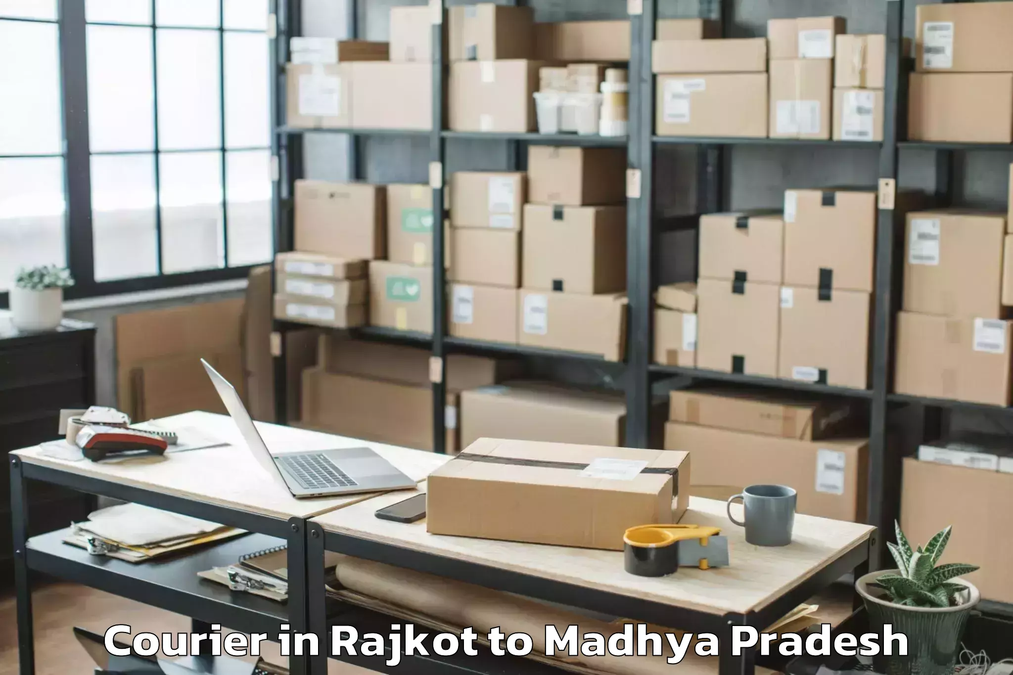 Book Rajkot to Gandhwani Courier Online